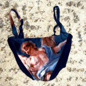 Angel corset top. Super cute and fashionable. Pairs well with loose jeans.